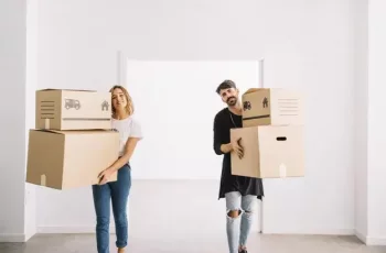 Moving with couple carrying packages